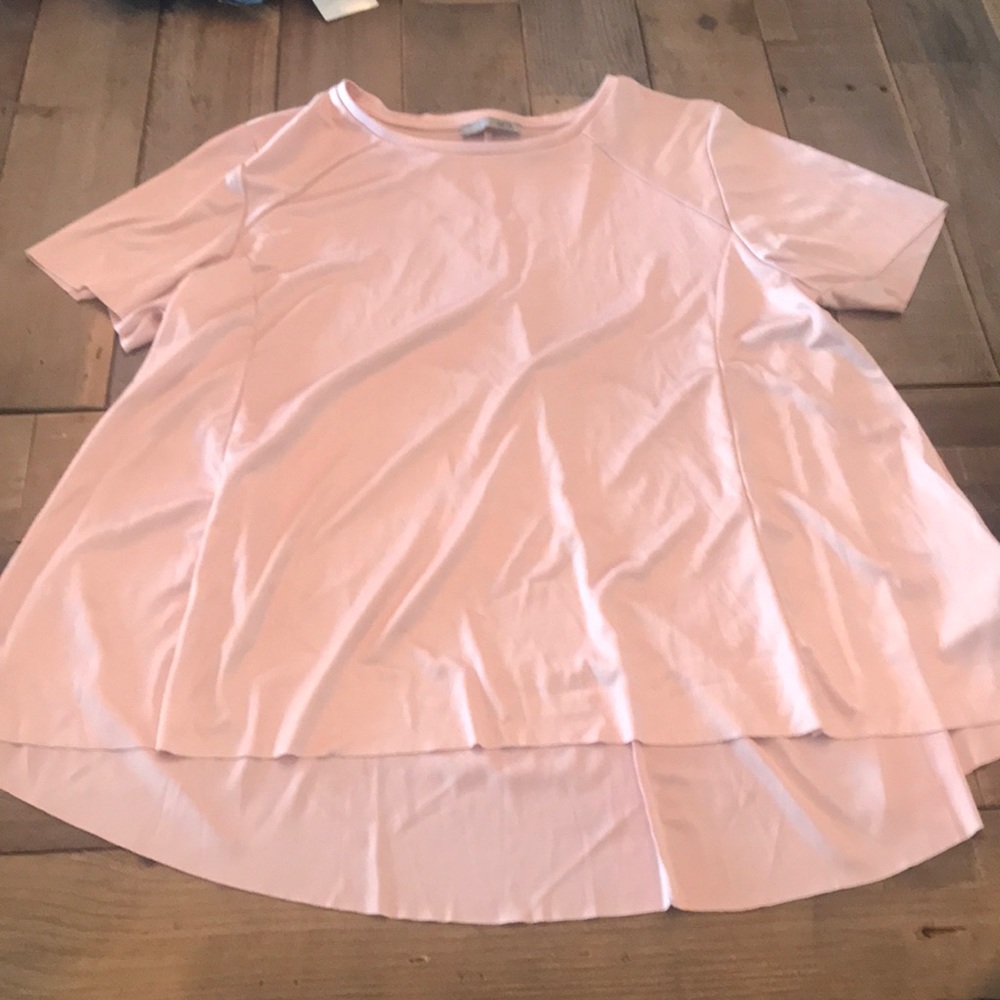 Loose light pink blouse